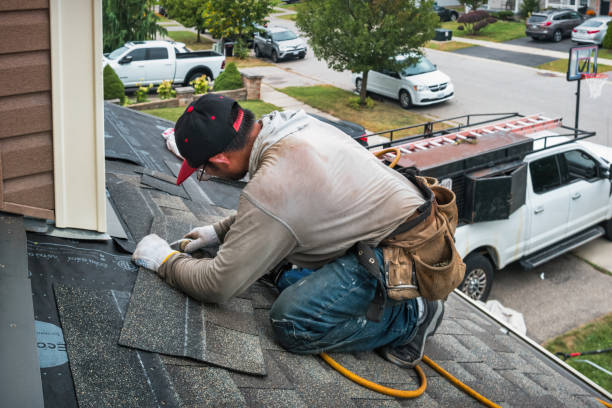 Professional Roof Replacement technician working in Mentcle, PA